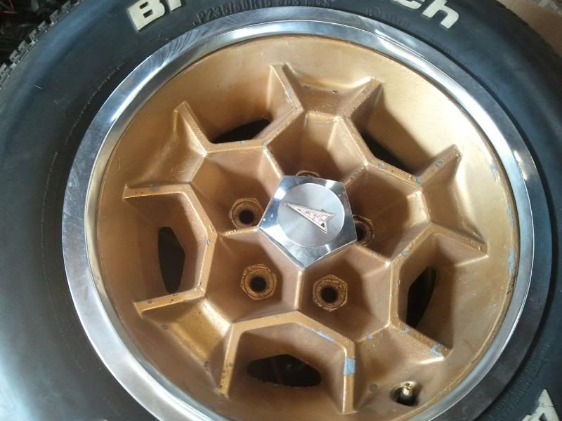 4 15x7 Gold Wheels with nearly new BFG's